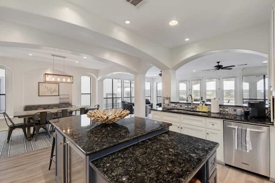 Large kitchen island with large dining table