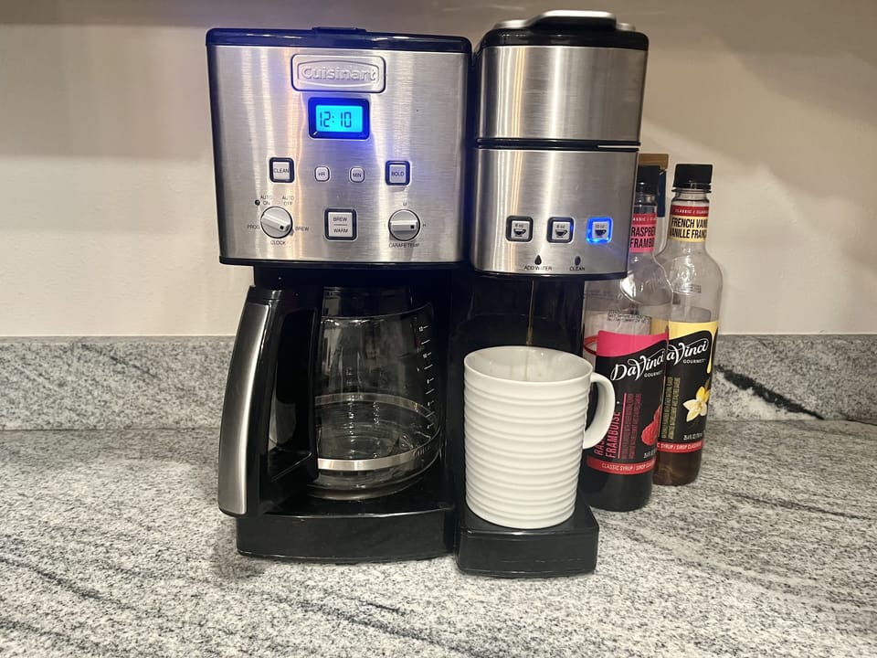 A Keurig with a complimentary selection of coffee, tea, and hot chocolate
