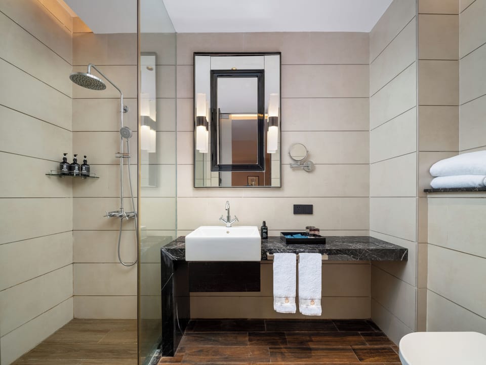 Shower, free toiletries, hair dryer, slippers