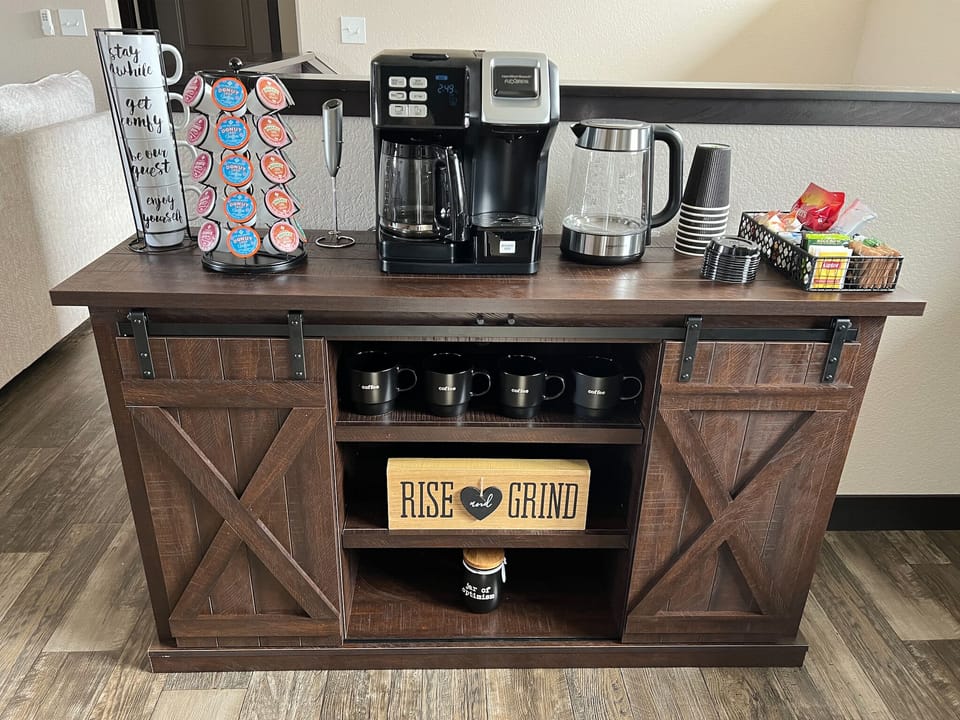 Coffee Bar ~ Stocked with coffee, creamers, tea, sweetener, tea kettle, frother.