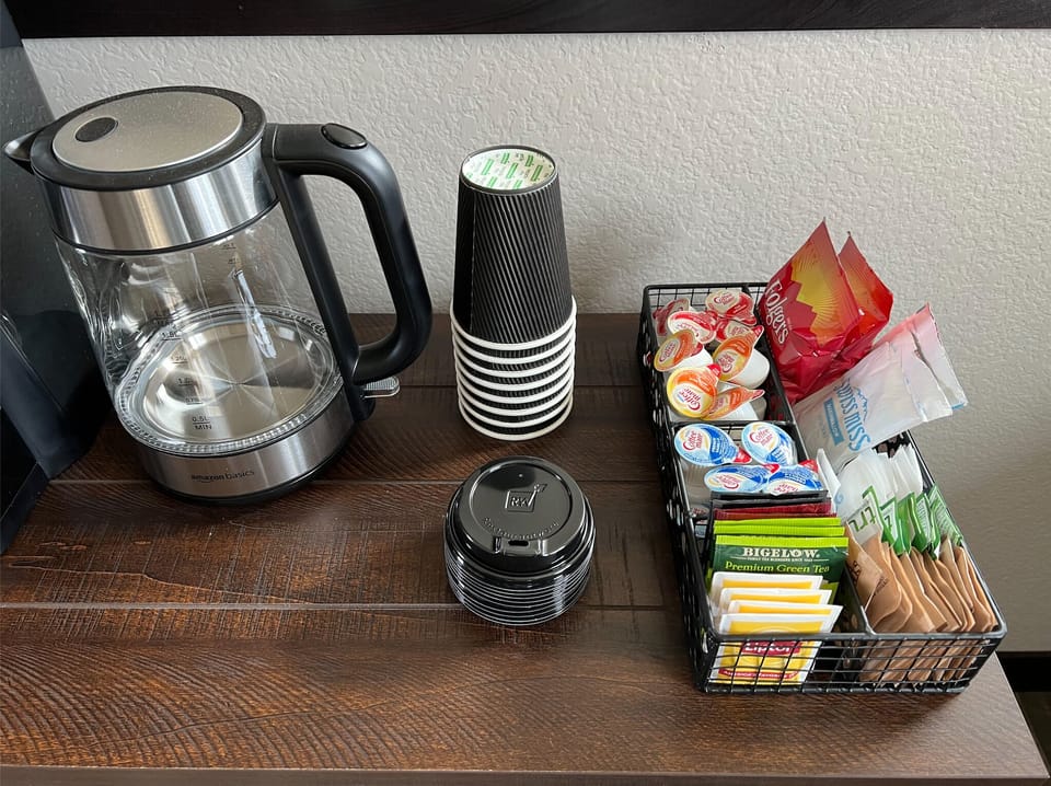 Coffee Bar Amenities ~ Variety of teas, creamers, sweeteners, and to go cups.