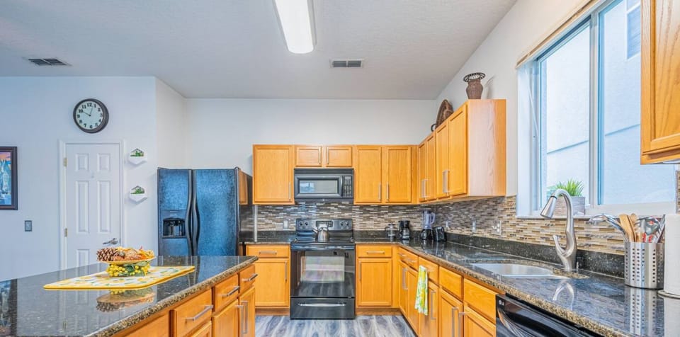 Cook, create, and enjoy in a kitchen built for culinary adventures and family gatherings.
