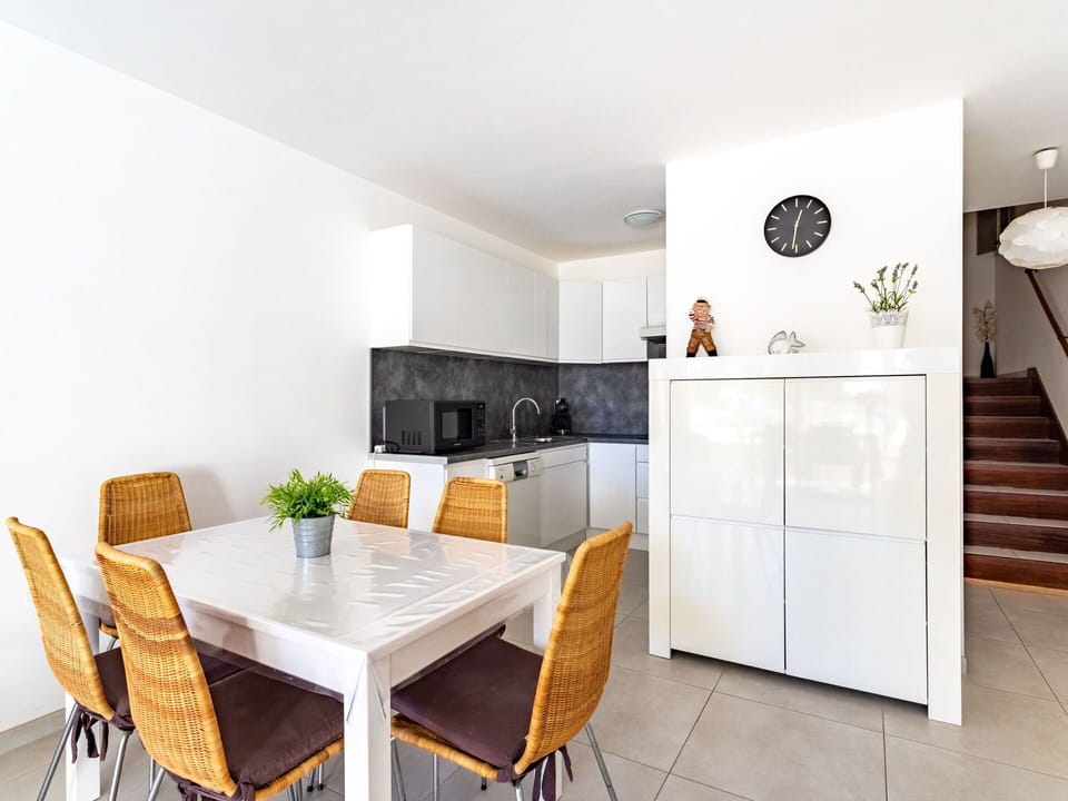 Table, Furniture, Cabinetry, Chair, Wood, Interior Design, Houseplant, Floor, Flooring