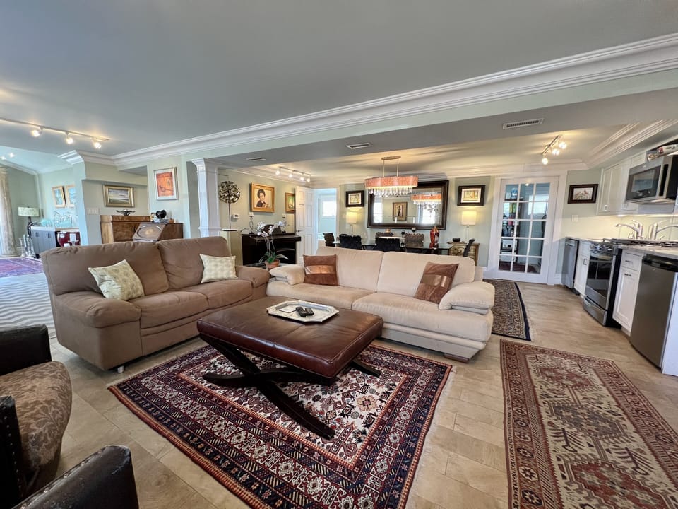 Living room open to Kitchen and Dining
