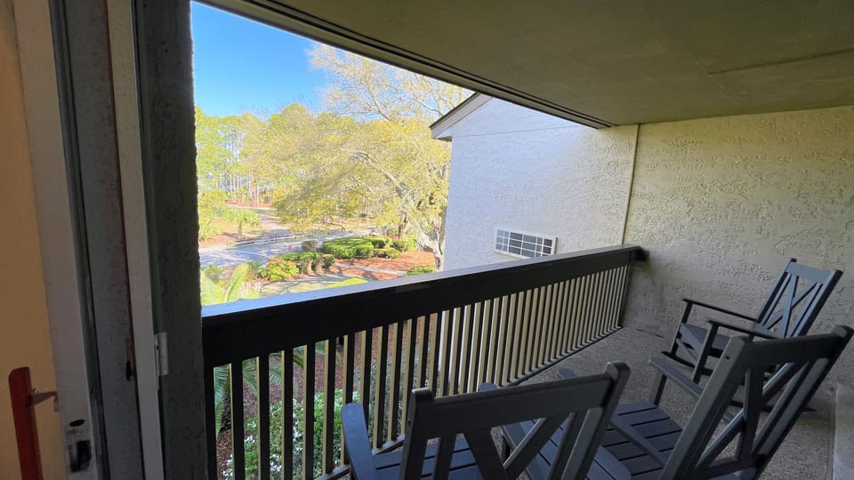 Enjoy sunsets from the balcony while looking out towards the water.
