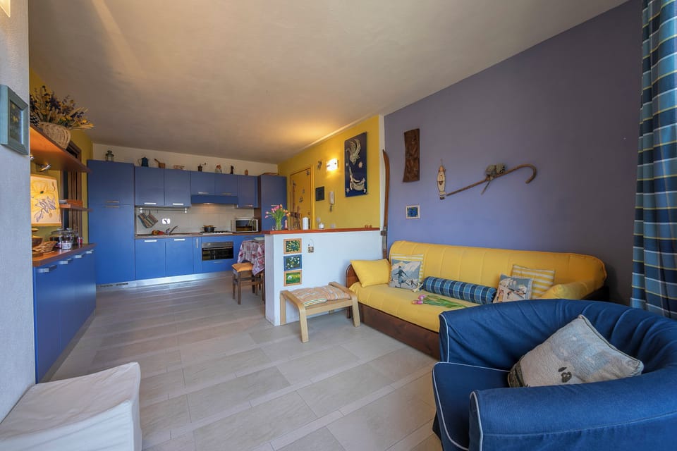 Family Apartment, Multiple Bedrooms (Rebecca's House (few steps from) | Living area | 21-inch TV with cable channels