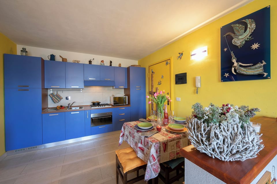 Family Apartment, 1 Bedroom, Balcony (Rebecca's House among the greenery) | Private kitchen | Stovetop, highchair, dining table