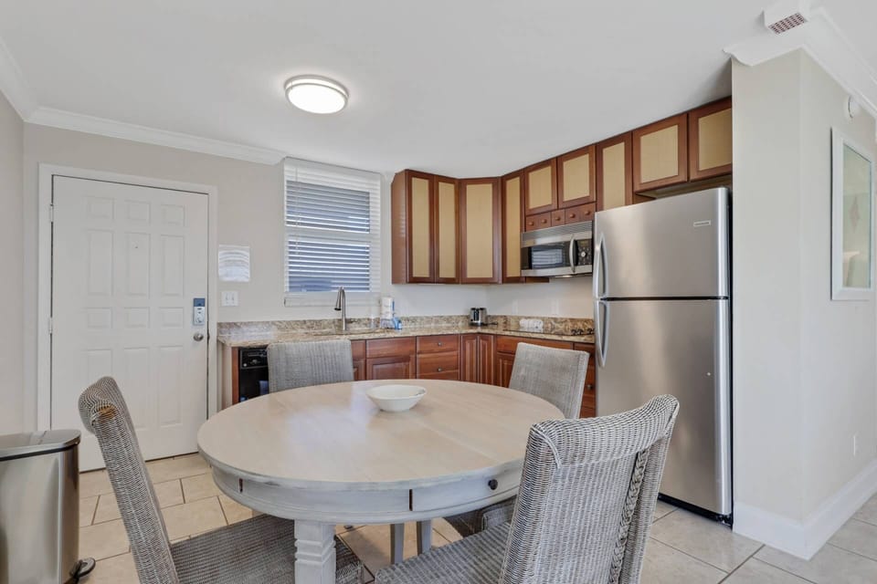 A dining table for 4 in the kitchen is a great for meals in the studio - or even a friendly game night.