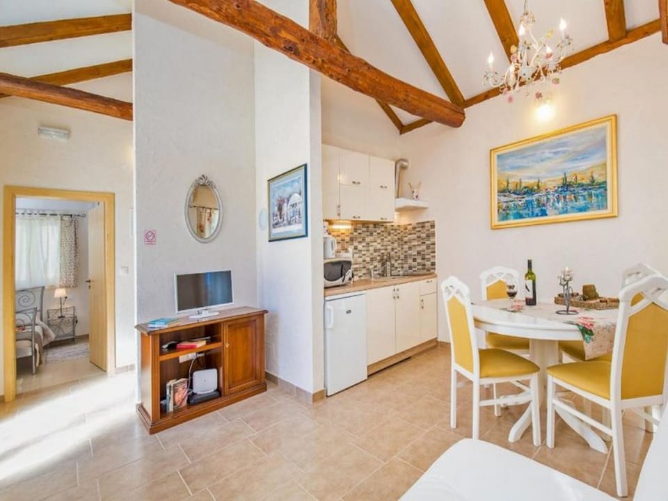House (Four Bedroom Holiday Home with Swimmi) | Living room | TV