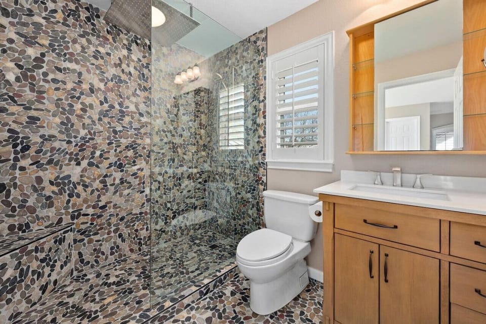 Refresh in the primary en-suite with a large walk-in shower—an easy, great experience after Lake Travis days in Spicewood, TX.