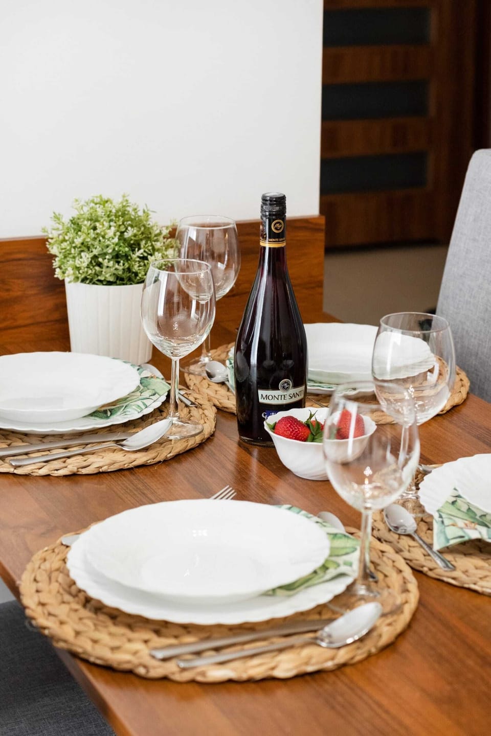 Dining table setup with stylish tableware and a welcoming ambiance.
