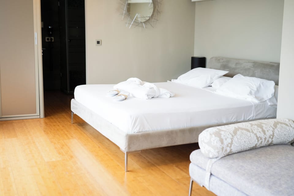 Deluxe Double Room, Sea View | In-room safe, desk, laptop workspace, blackout drapes