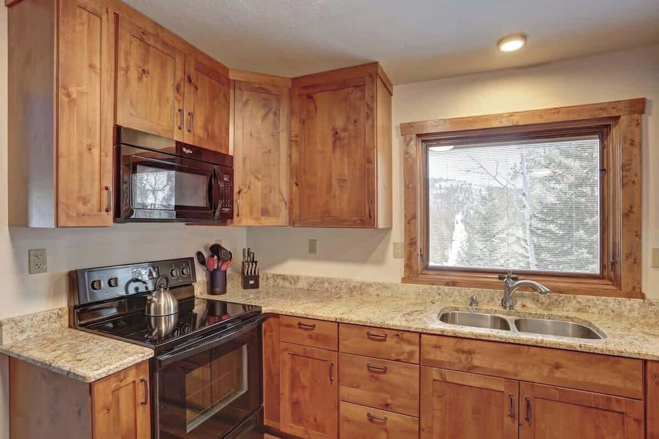 Kitchen with Marble Counters