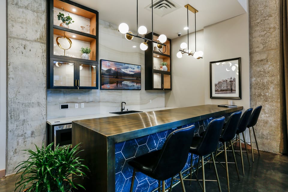 Entertain your friends at this awesome wet bar. Microwave, fridge, dishwasher, sink, and cable TV are all available!