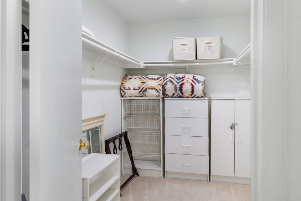 Large walk-in closet with extra blankets and plenty of storage space, making it easy to settle in and feel right at home.