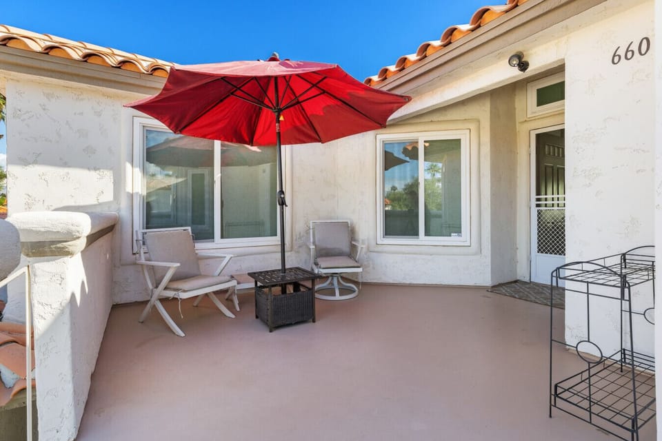 Sunny front patio perfect for morning coffee, quiet reading time, or unwinding after a day of family fun.