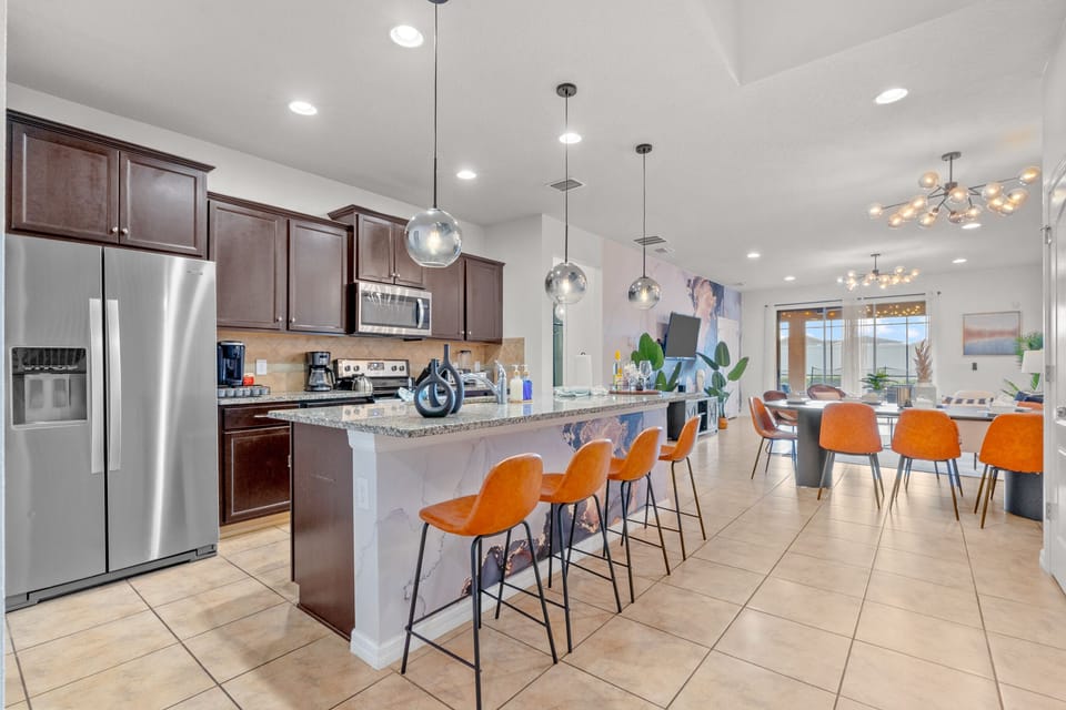Enjoy the open concept, bar seating and dining room.
