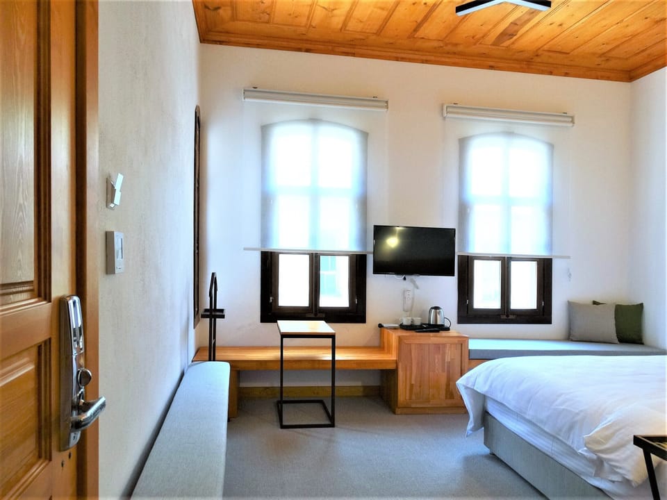 Premium bedding, minibar, desk, laptop workspace