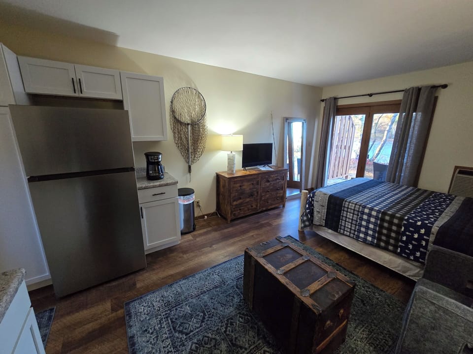 Full fridge/freezer and drip coffee pot with coffee supplies included.