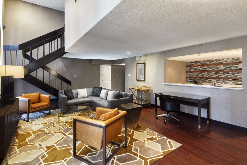 Suite, 1 King Bed, Non Smoking | Premium bedding, down comforters, pillowtop beds, in-room safe