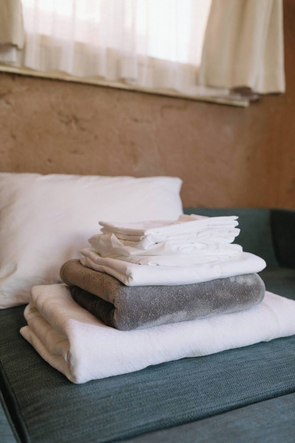 We provide sheets, blankets, and a pillow for use on the sofa sleeper.