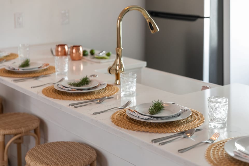 Plenty of island dining space, bohemian wicker seating 