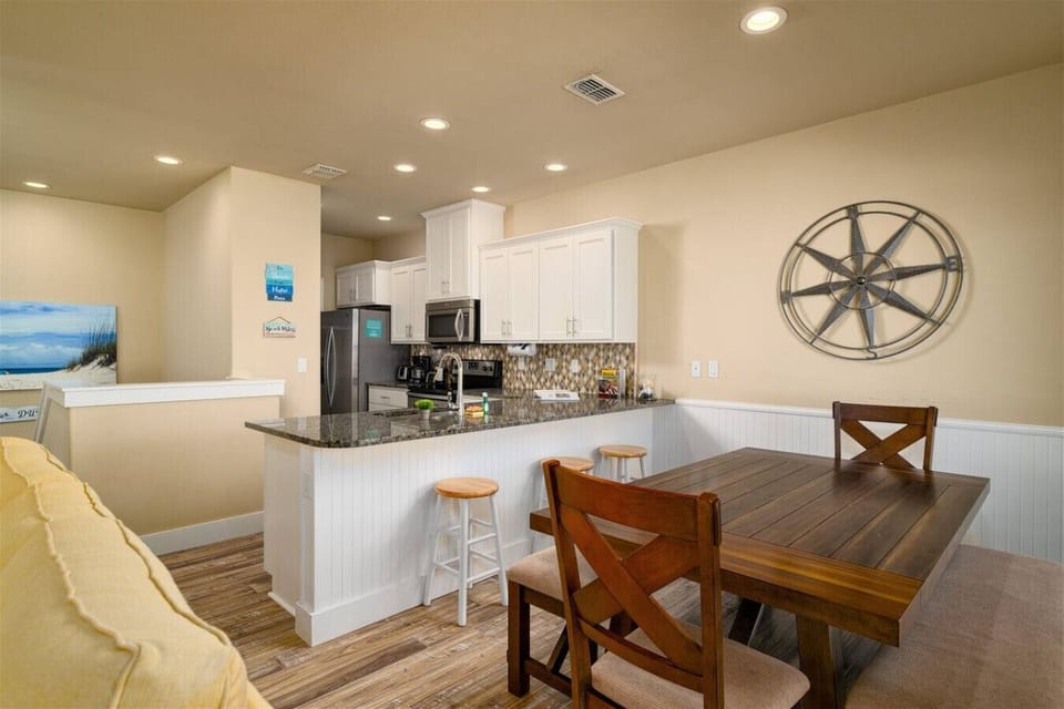 Cozy-meets-classy dining room—perfect for vacation dinners in.