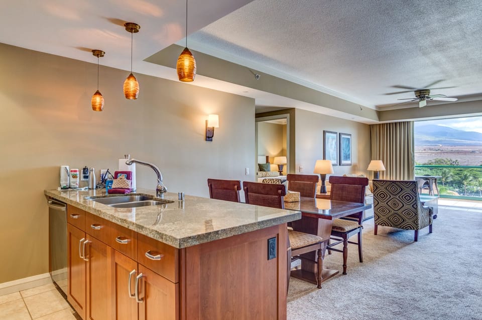 Kitchen, dining, living room and folding, glass NanaWall to lanai.