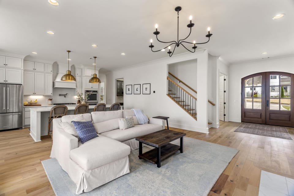 Open concept is perfect for entertaining w/ plenty of seating and 65" Smart TV