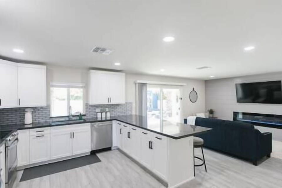Large open kitchen that opens to second living area