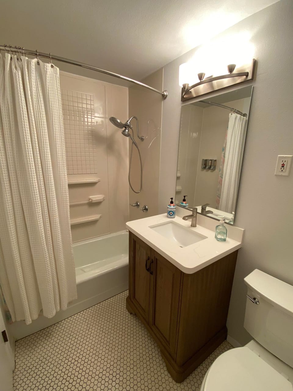 2nd Master bathroom with tub shower.