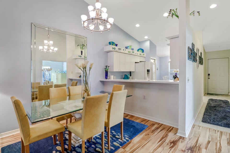 An open bar separates the two spaces - great for entertaining.