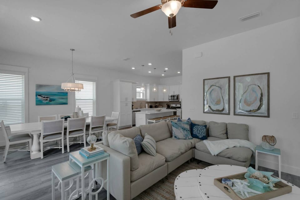 Coastal style, open concept living area with plenty of space for your group