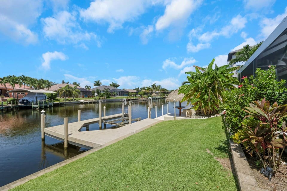 Located on a Gulf access canal, the waterfront area is as inviting as the rest of the home.