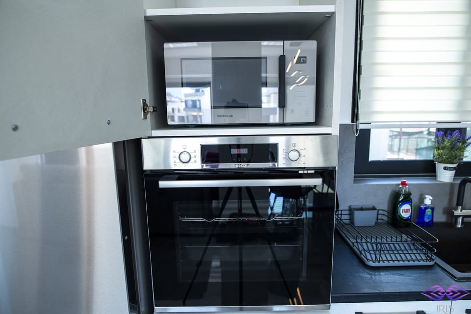 Fully equipped kitchen with view of Acropolis.