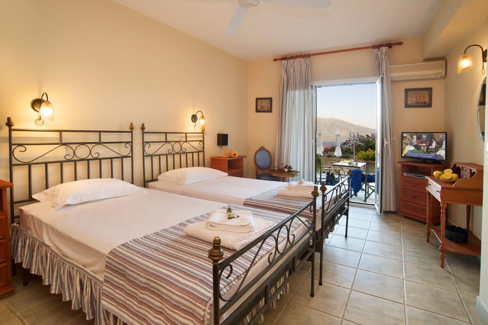 Standard Double or Twin Room, Partial Sea View | Desk, soundproofing, iron/ironing board, free WiFi