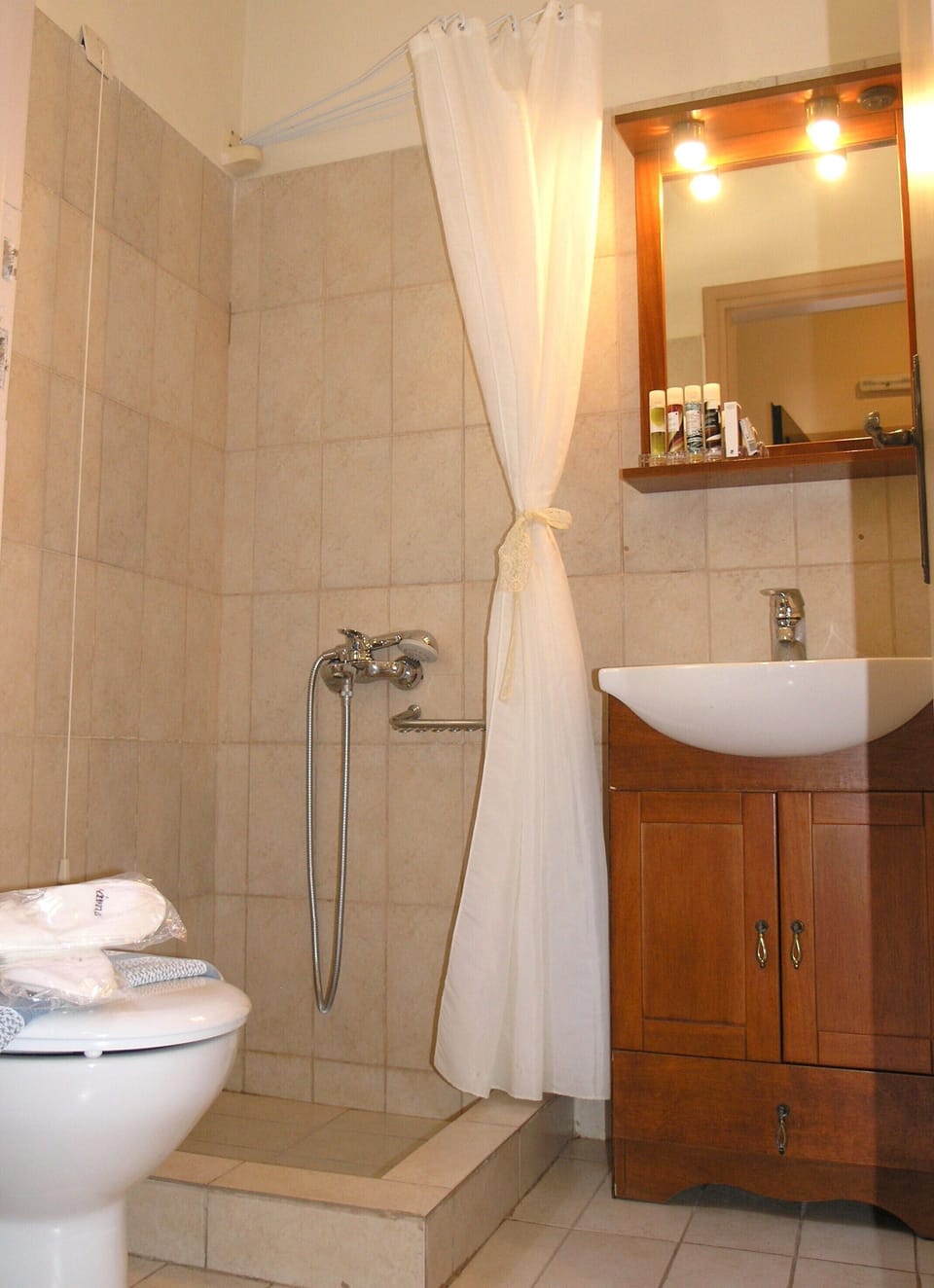 Hair dryer, slippers, towels, soap