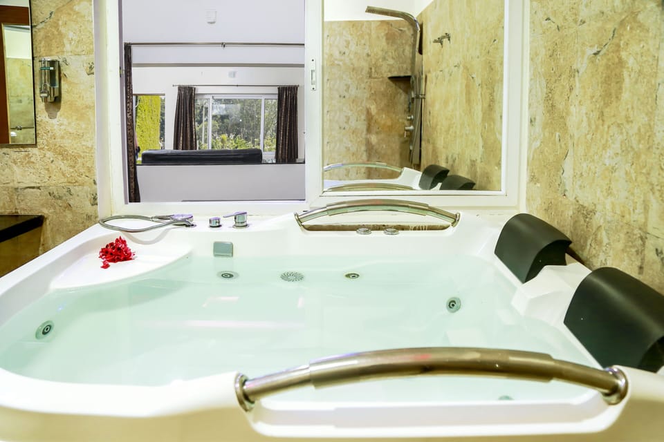Premium with Hot Tub | Bathroom | Free toiletries, hair dryer, towels