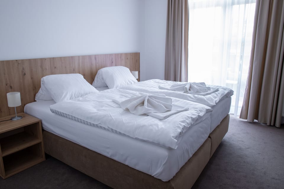 Standard Quadruple Room, 2 Bedrooms | Cribs (free), WiFi (free), bed sheets