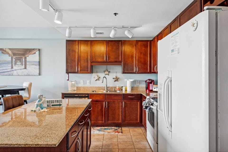 Kitchen stocked w/utensils, plates, cookware, keurig & blender 