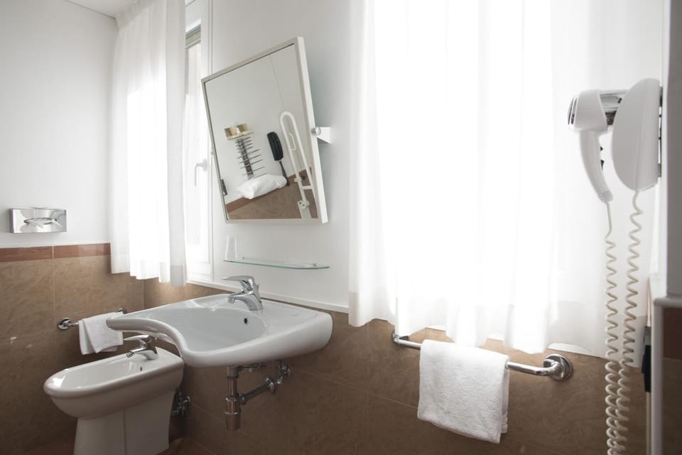 Rainfall showerhead, free toiletries, hair dryer, bidet