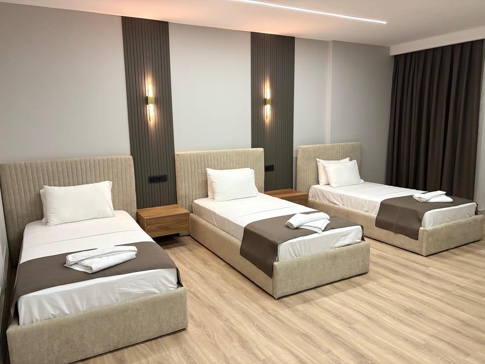 Standard Triple Room | Egyptian cotton sheets, Select Comfort beds, desk, laptop workspace