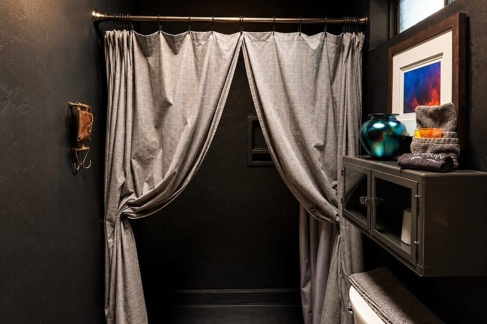 Primary bath with convenient shower for your stay.