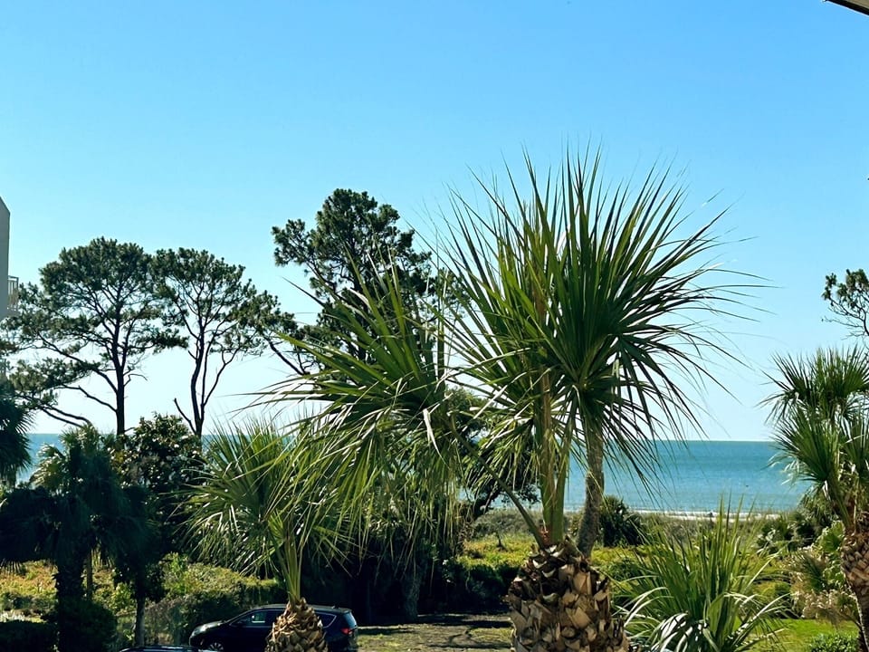 Zoomed-in balcony shot of the beach - just steps to the sand