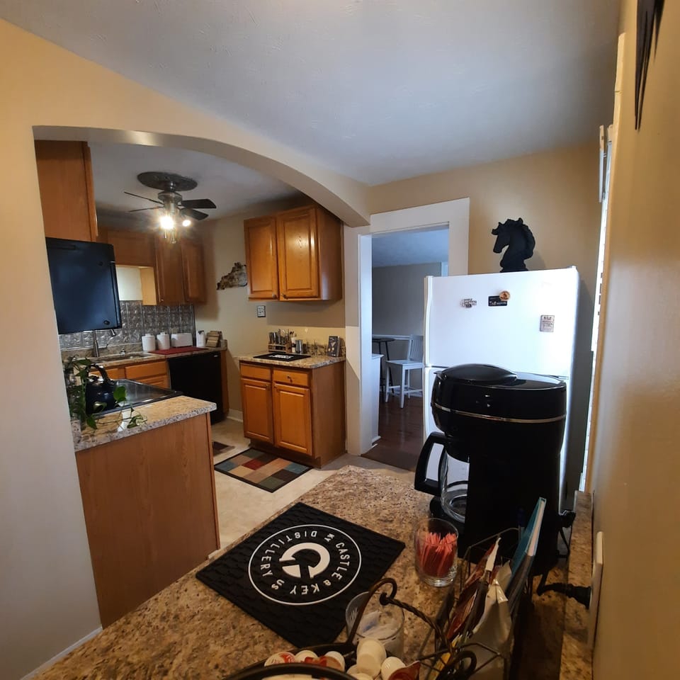 Kitchen is next to the game room.