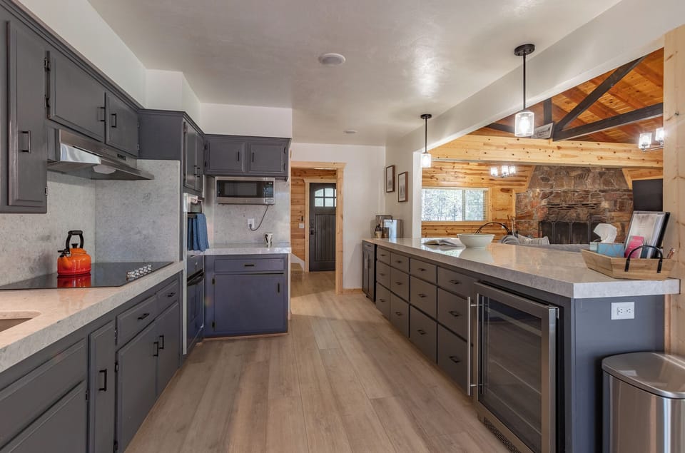 Open-concept kitchen with views of the dining and living room 