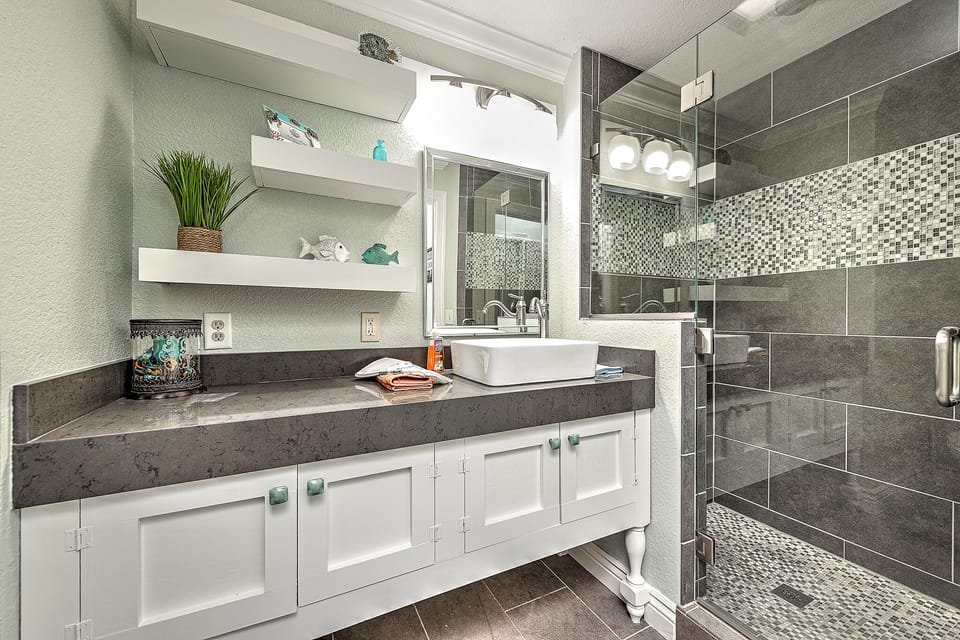 Your Master En Suite is clean, modern, and attached to an oversized walk in master closet where you'll find a pack n play and other supplies.