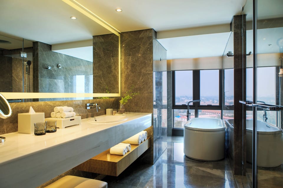 Combined shower/tub, free toiletries, hair dryer (on request), bathrobes