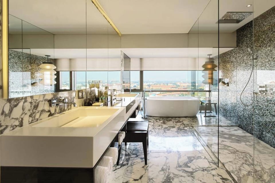 Combined shower/tub, free toiletries, hair dryer (on request), bathrobes