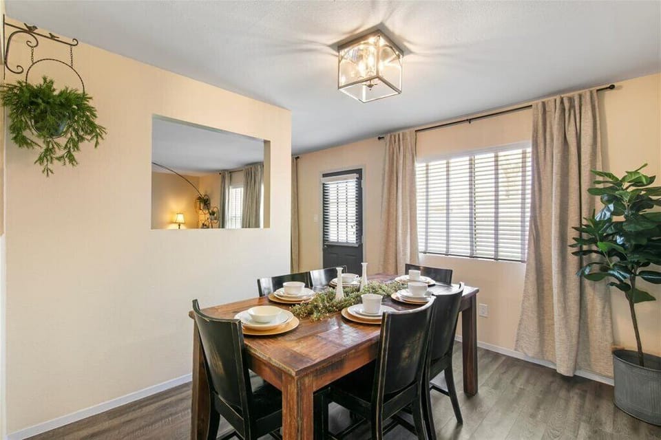 Dining area seats six, with with beautiful, natural light.